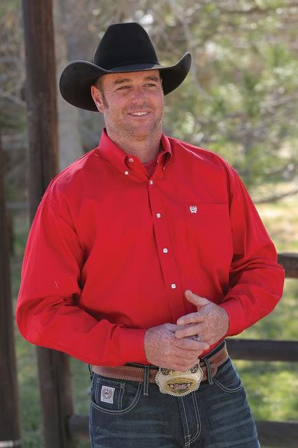 Cinch Pinpoint Collection. Cotton pinpoint shirt with button down collar, square buttons, neck tape and Cinch logo. Shirt is patterned in the Cinch body style and available in timeless colors. Color is red with long sleeves